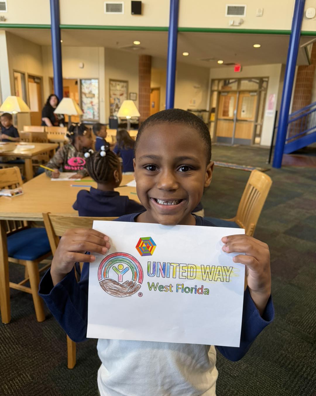 boy holding a picture