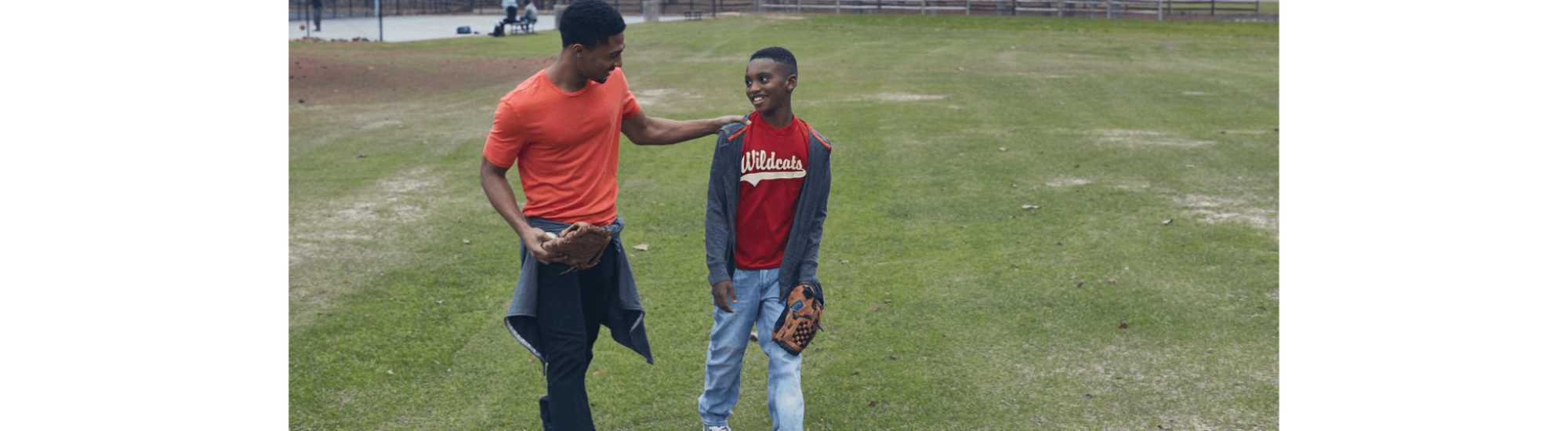 Two boys playing baseball.