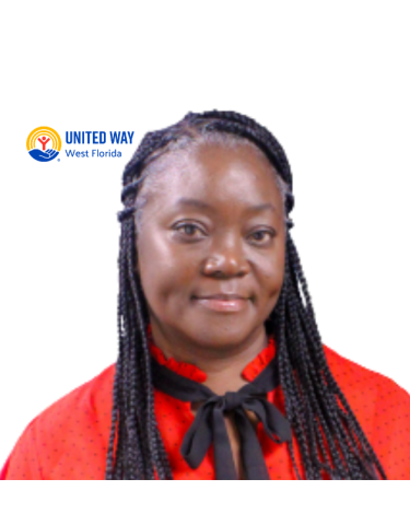 Picture of a woman in a red shirt smiling.